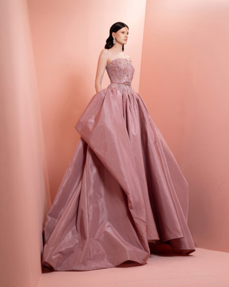 Strapless pink satin dress featuring a  fitted embellished bodice and a voluminous skirt