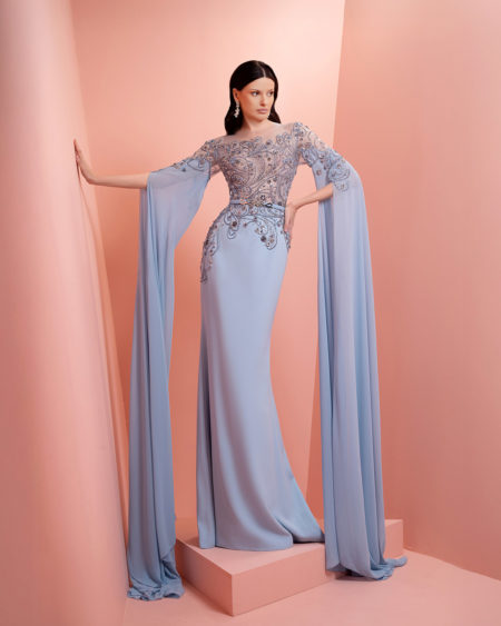 Blue beaded dress with long sleeve scarves
