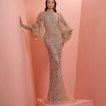 Fully beaded dress with puffy sleeve