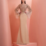 Beige beaded crepe dress with feathers  on the sleeve cuff