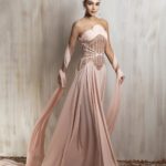 Blush strapless gown with a structured embellished corset