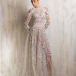 Sheer off - white gown with high neckline