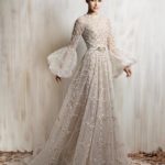 Ivory beaded long sleeve gown with sheer  voluminous sleeves
