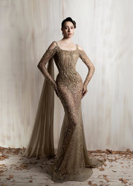 Bronze beaded mermaid gown with sheer sleeves and  musslin shoulder shawl