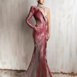 Rose pink sculpted satin gown with sheer beaded panels and one-shoulder sleeve