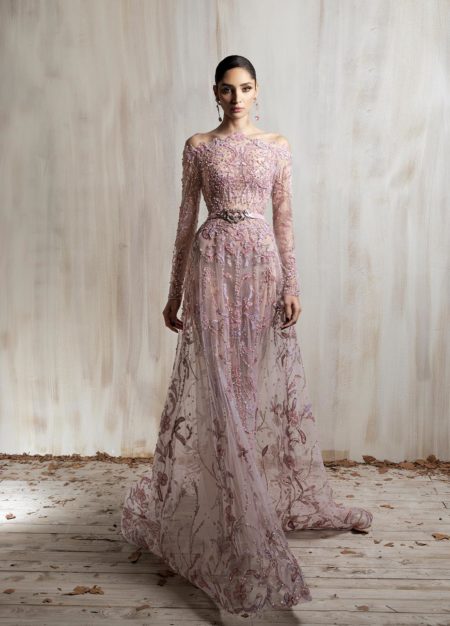 Blush pink embroidered tulle gown with sheer sleeves and fitted silhouette