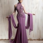 Mauve draped gown with beaded halter bodice and flowing scarf sleeves