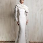 off - white fitted gown with gold embellishments