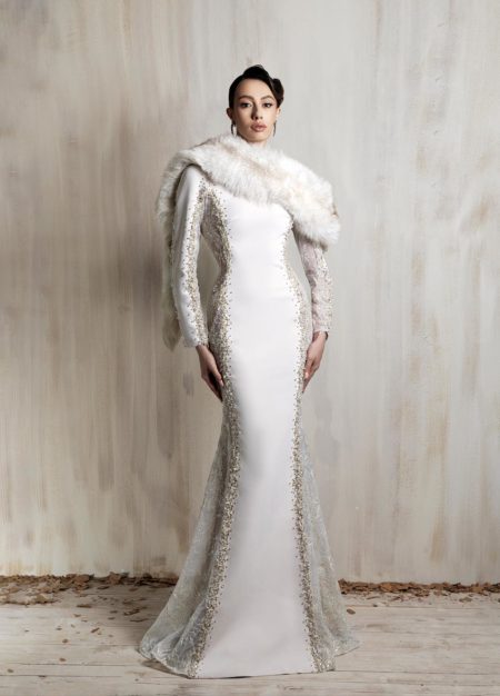 off - white fitted gown with gold embellishments