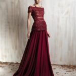 Deep red off-shoulder gown with beaded bodice and  flowing crepe - georgette skirt