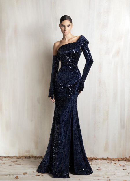 Navy sequined off-shoulder mermaid gown with gloves sleeve.