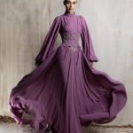 Flowing mauve gown with a sculpted embellished corset.