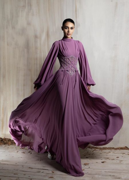 Flowing mauve gown with a sculpted embellished corset.